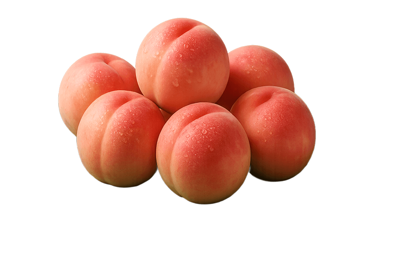 Fruit on a glazed plate — wet, glossy surfaces